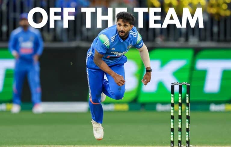 India cricket player running on field celebrating a successful play.