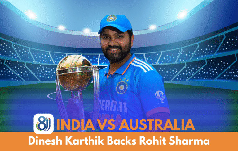 Cricketer Dinesh Karthik celebrating India's victory with ICC trophy at a stadium.